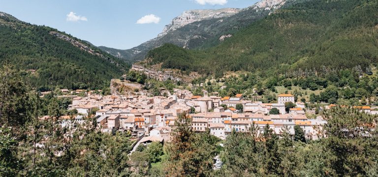 Châtillon en Diois, in the Drôme department, southeastern France. The town offers traditional architecture with its narrow medieval streets and houses under the steep cliffs of Glandasse mountain.